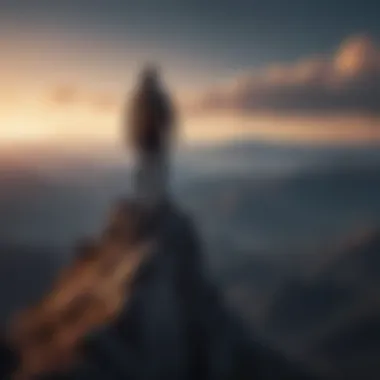 A silhouette of a person standing on a mountain peak, representing overcoming challenges