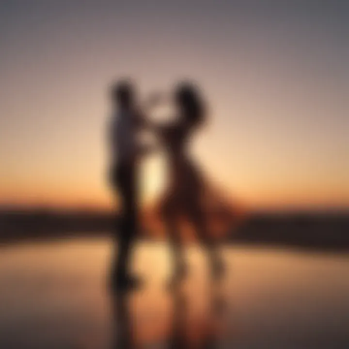 Silhouettes of couple dancing in the sunset