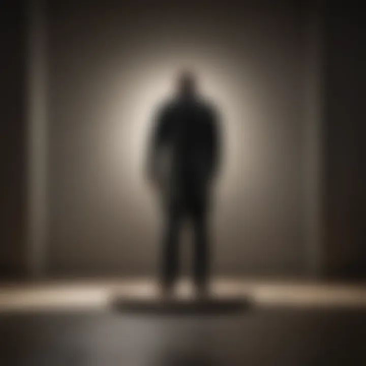 A shadowy figure standing alone, illustrating feelings of isolation