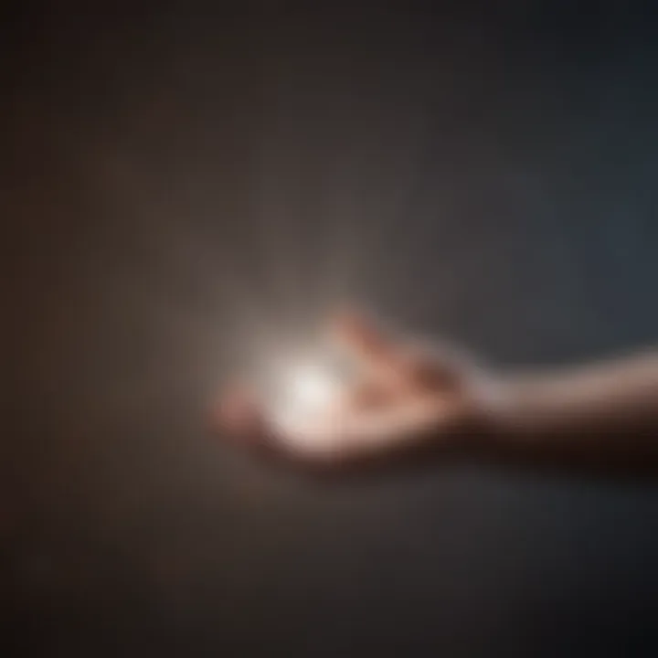 A person reaching out to touch a glowing light symbolizing hope and possibility