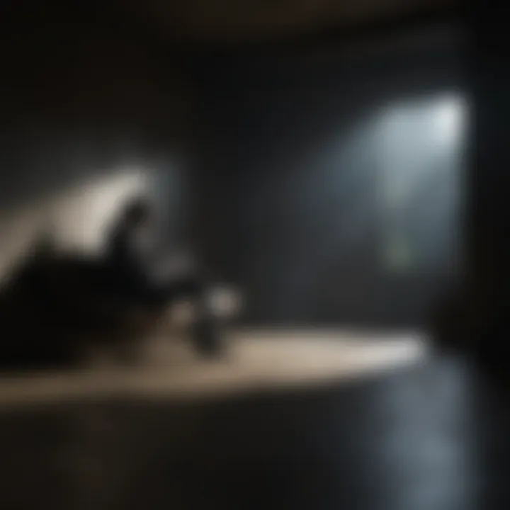 Silhouette of a person sitting alone in a dark room contemplating