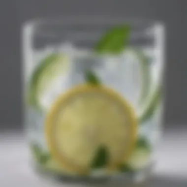 Glass of lemon water with cucumber slices