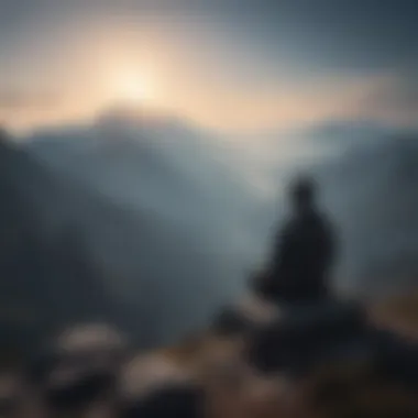 Silhouette meditator at mountain peak