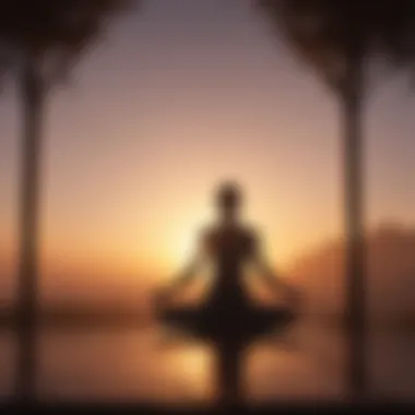 Silhouette of a person in yoga pose at sunrise