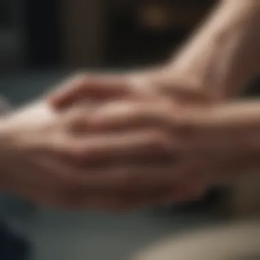 Person holding a hand of a depressed loved one